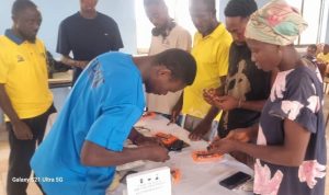 MTN employee volunteers and beneficiaries during the training at Apowa 1