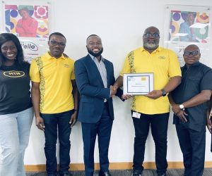 Mr William Tetteh (2nd r) leads the MTN Team to receive the Global Executive Council Certificate from P
